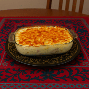 family-style creamy dish served hot in a large white ceramic bowl, garnished with fresh herbs and ready for a cozy family dinner.